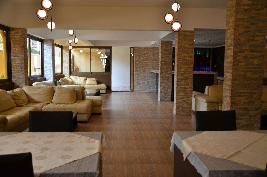 Prestige Hotel Suites Kampala Restoran fotoğraf